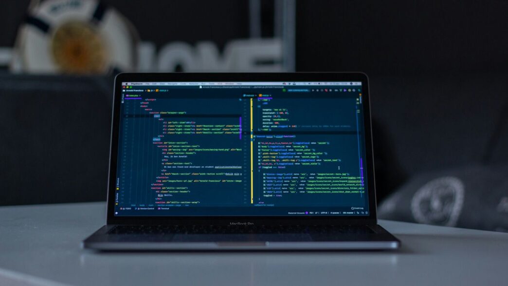 turned-on grey laptop computer