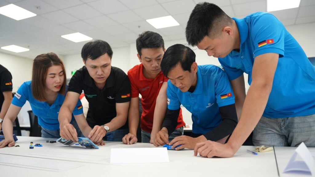 Team collaborating on a project at a table.