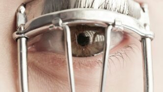 person wearing silver framed eyeglasses