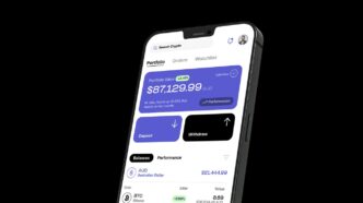 a cell phone with a credit card on the screen