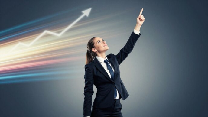 Business professional reaching upwards towards success.