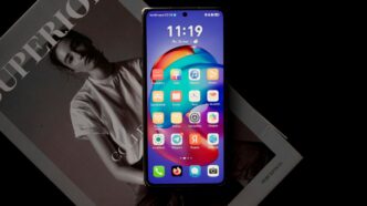 Smartphone displaying colorful app icons on screen