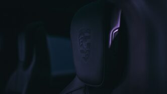 a close up of a steering wheel in a car