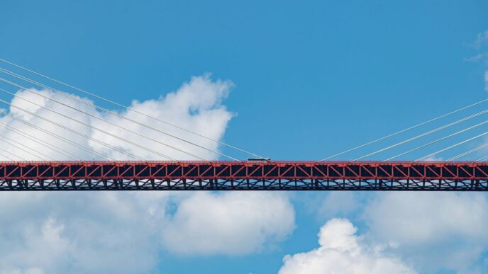 a bridge with a train going over it