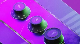 Three green knobs on a control panel
