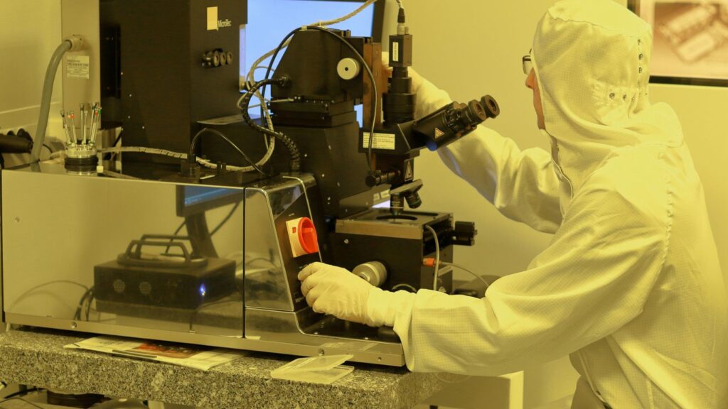 person using black industrial machine