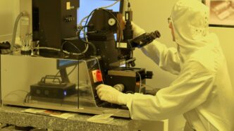 person using black industrial machine