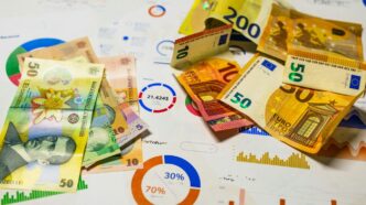 A bunch of money sitting on top of a table