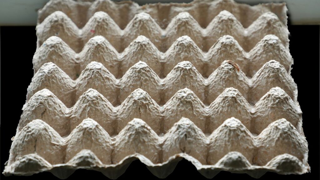 A close up of a piece of paper with a wave pattern on it