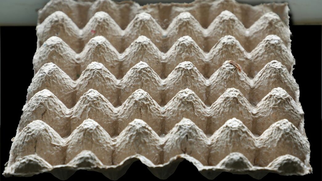 A close up of a piece of paper with a wave pattern on it