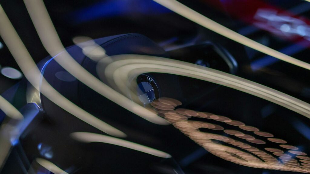 Abstract swirling lines and shapes on dark background