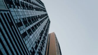 a very tall building next to a very tall building