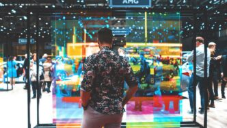 man standing on AMG display
