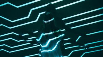 woman leaning on wall