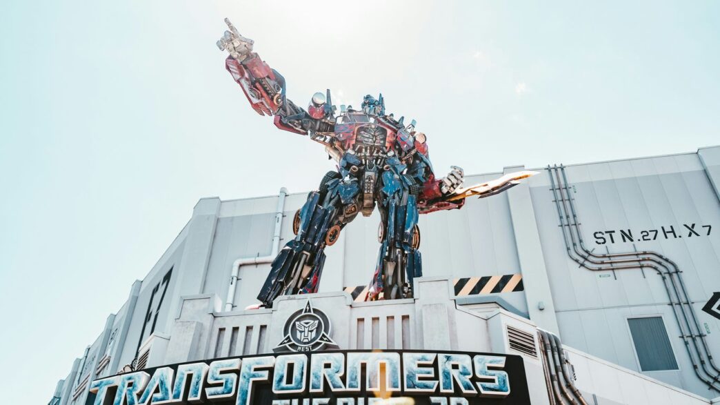 man in red and black suit statue