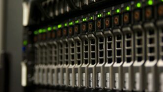 Server rack with blinking green lights