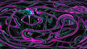 A black background with pink and blue swirls