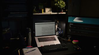 a laptop sits on a desk