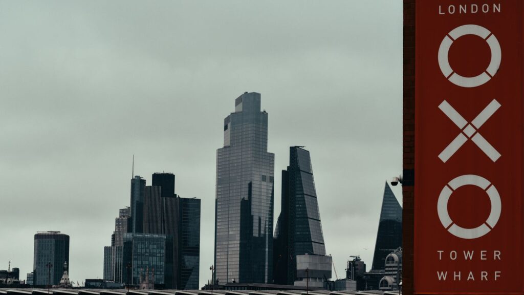 a city skyline with a sign