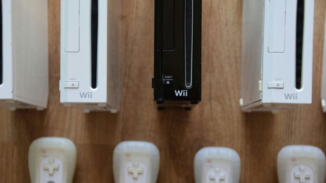 a row of wii remotes sitting next to each other