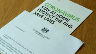 white printer paper on brown wooden table