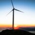 silhouette of wind mill during golden hour