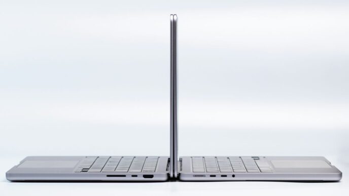 a silver laptop with a black keyboard