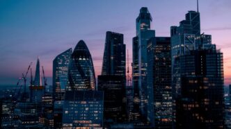 a view of the city of london at dusk
