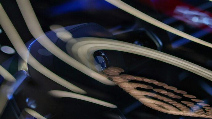 Abstract swirling lines and shapes on dark background