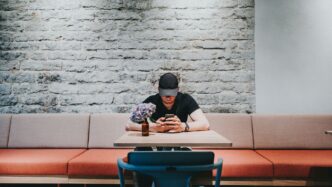 man looking at his cellphone