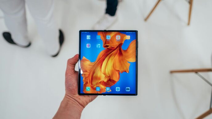 person holding black android smartphone