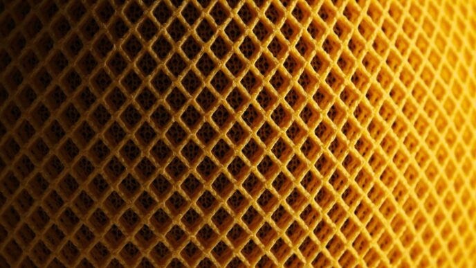 a close up view of a yellow fabric