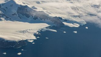 snow covered mountain during daytime