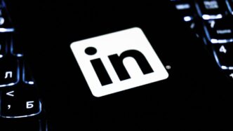 Linkedin logo on a dark keyboard
