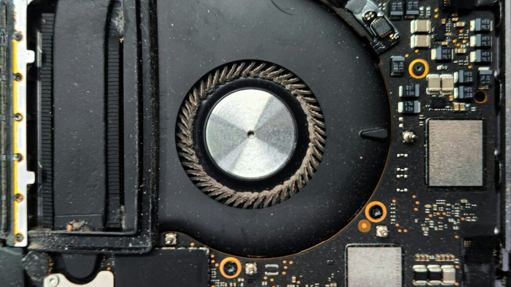 Close-up of a computer fan and circuit board