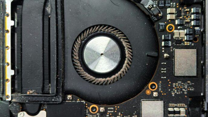 Close-up of a computer fan and circuit board
