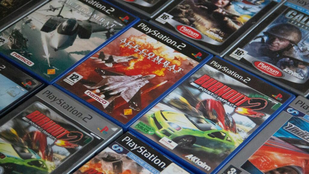 a pile of video games sitting on top of a table