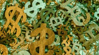 gold and silver cross pendant