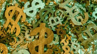 gold and silver cross pendant