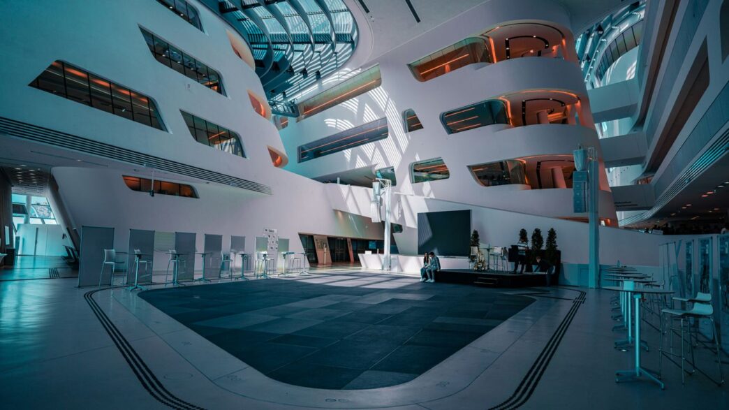 a large room with a lot of windows and a skylight