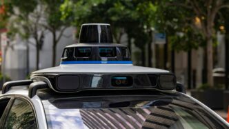 Self-driving car with sensors on city street