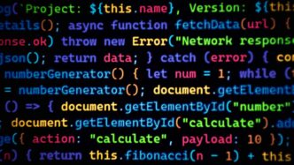 Colorful code scrolls across a dark background.