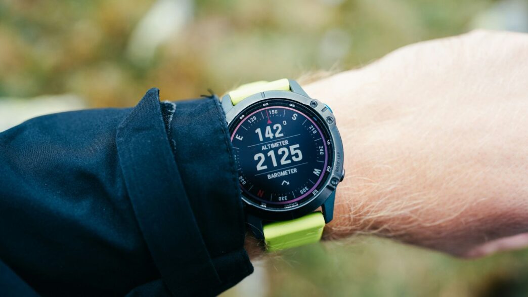 A close up of a person wearing a wrist watch