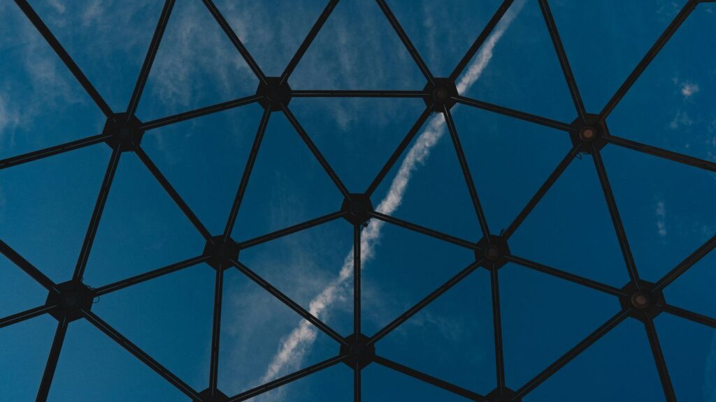 a clear blue sky with some clouds in it