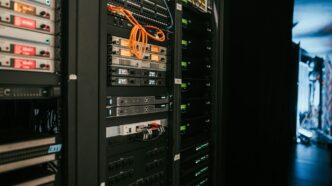 a rack of servers in a server room