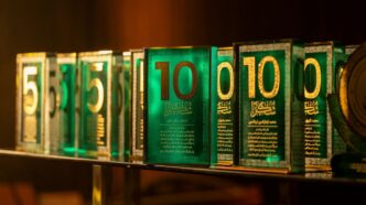 Row of green awards with numbers five and ten