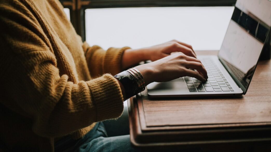 person using laptop