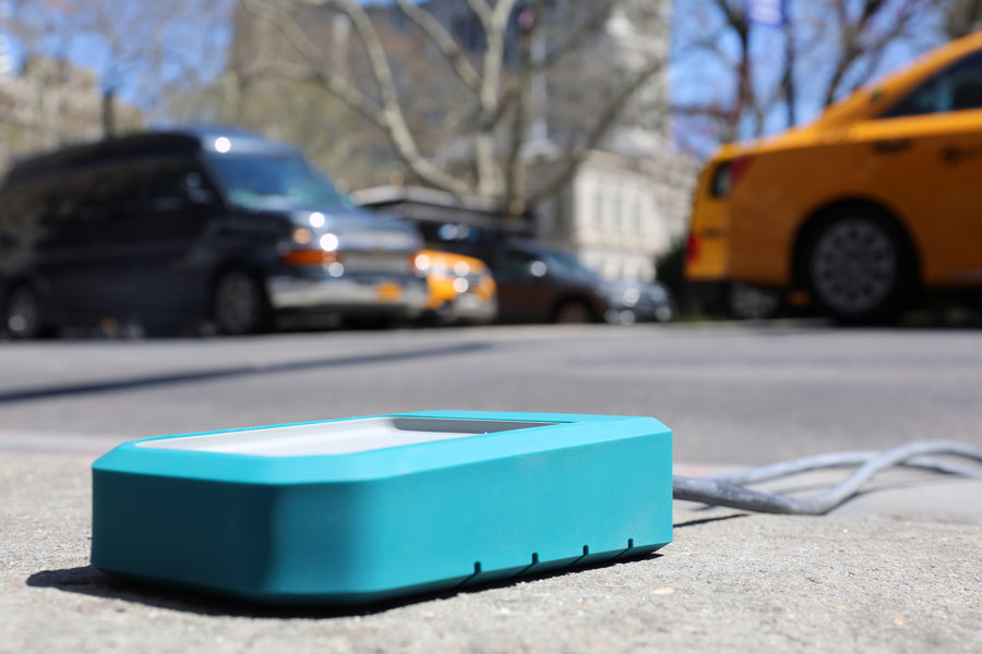 device on street pavement